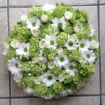 #### Green and white loose based round posy
  12