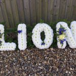 ### Based letters ribbon or foliage edging £35 each