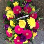#### small oval vibrant spray   £40  (flowers may vary)